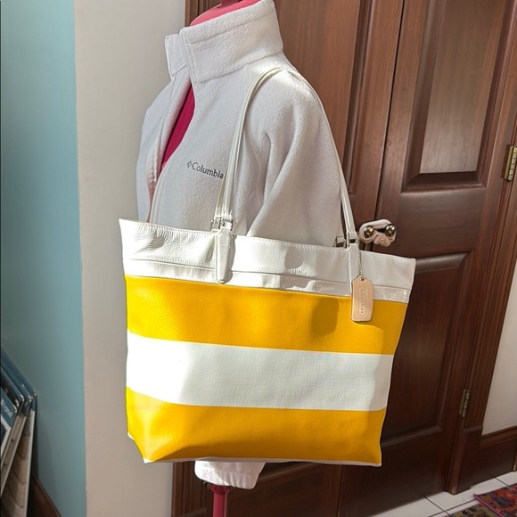 Coach Handbags - Coach  Tote  striped  yellow/white PVC   leather & patent leather trim
30511 EUC